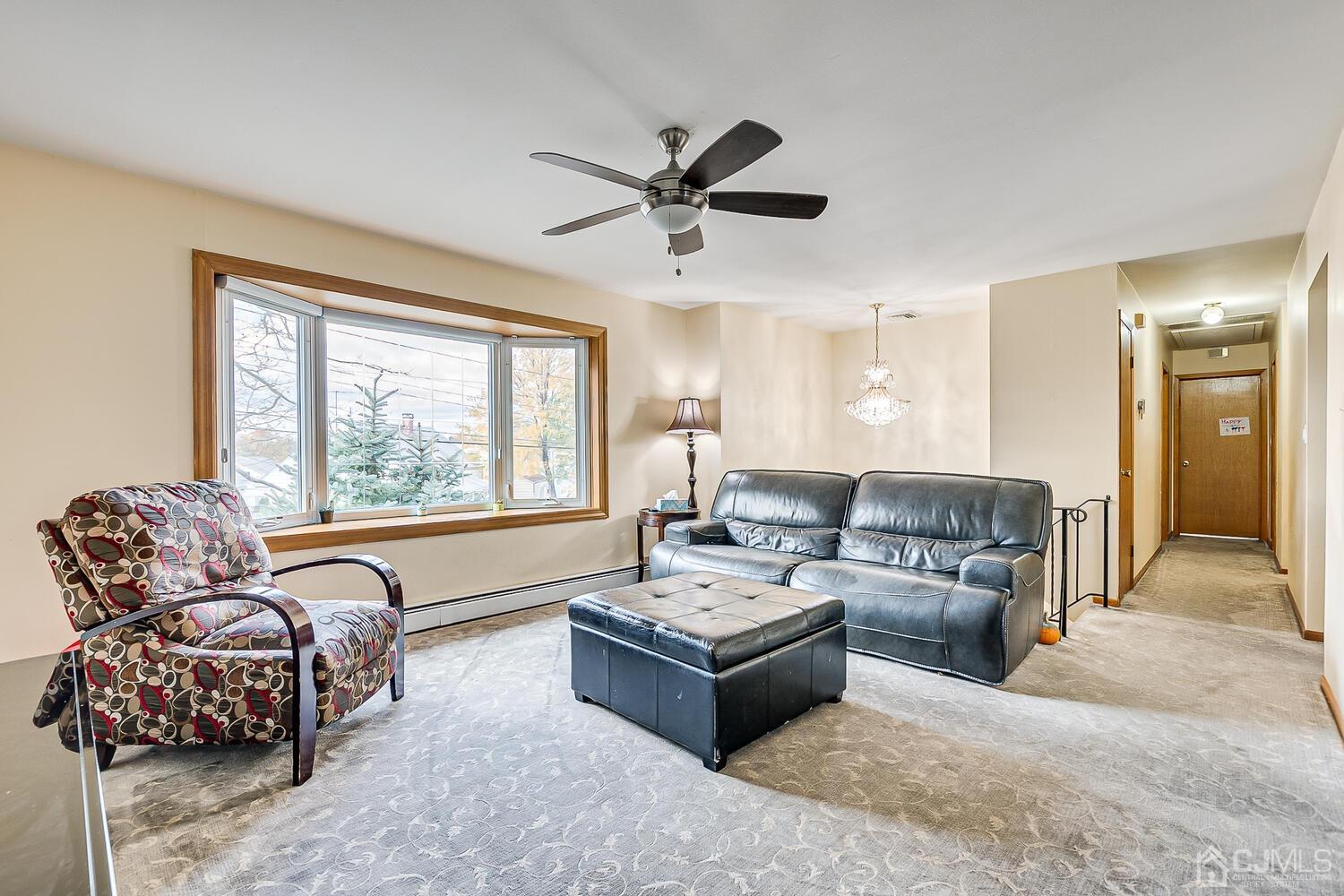 48 Brandywine Road Fords, NJ 08863 - Photo 5 of 29 a living room with furniture and a large window