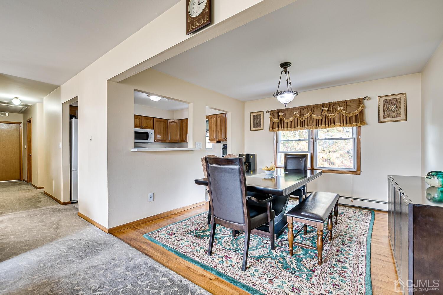 48 Brandywine Road Fords, NJ 08863 - Photo 8 of 29 a view of a dining room with furniture window and wooden floor