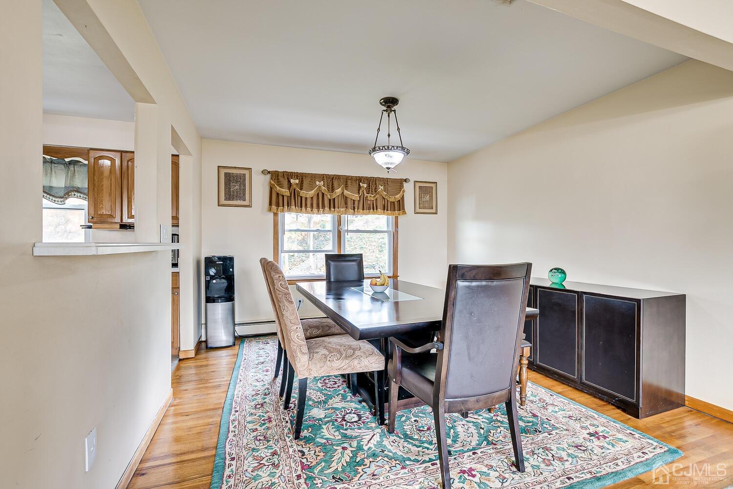 48 Brandywine Road Fords, NJ 08863 - Photo 10 of 29 a view of a dining room with furniture window and wooden floor