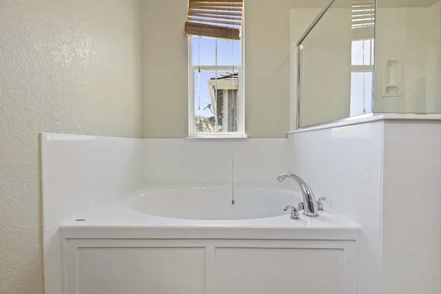 a bathroom with a bathtub