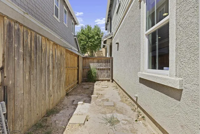 a view of a pathway with a house
