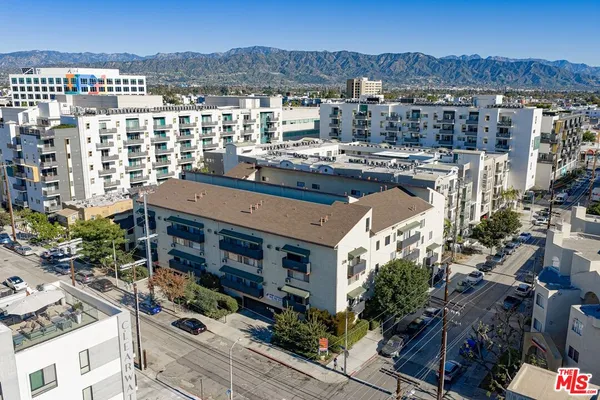 a large building with a city view