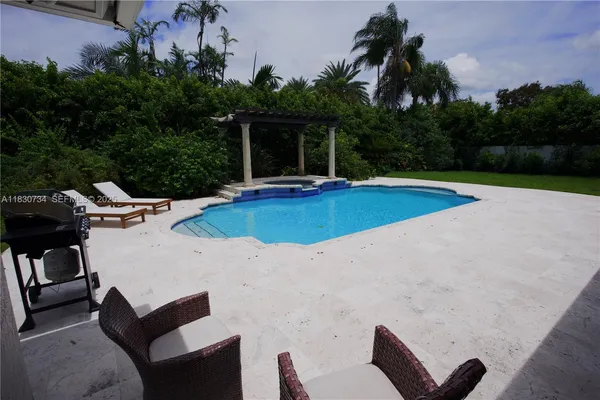 a bathroom with a sink vanity granite and toilet