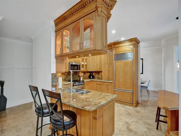 a view of a house with pool porch and sitting area