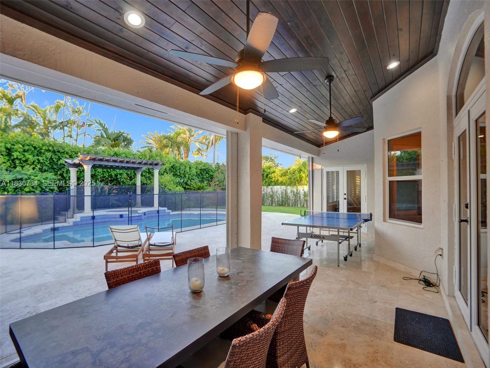 12401 Southwest 77th Street, Unit 12401 Miami, FL 33183 - Photo 55 of 95 a outdoor space with patio
