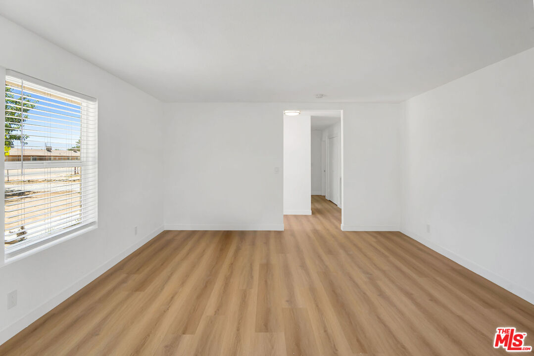 15376 Washoan Road Apple Valley, CA 92307 - Photo 29 of 40 a view of an empty room and window