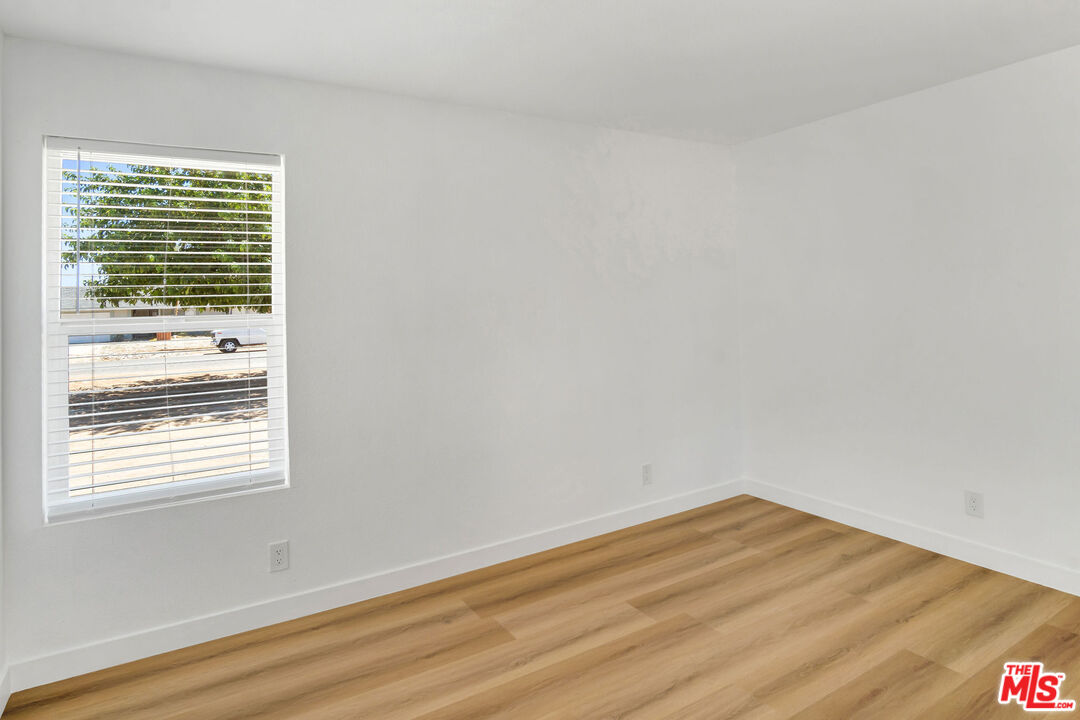 15376 Washoan Road Apple Valley, CA 92307 - Photo 32 of 40 a view of a room that has a window in it