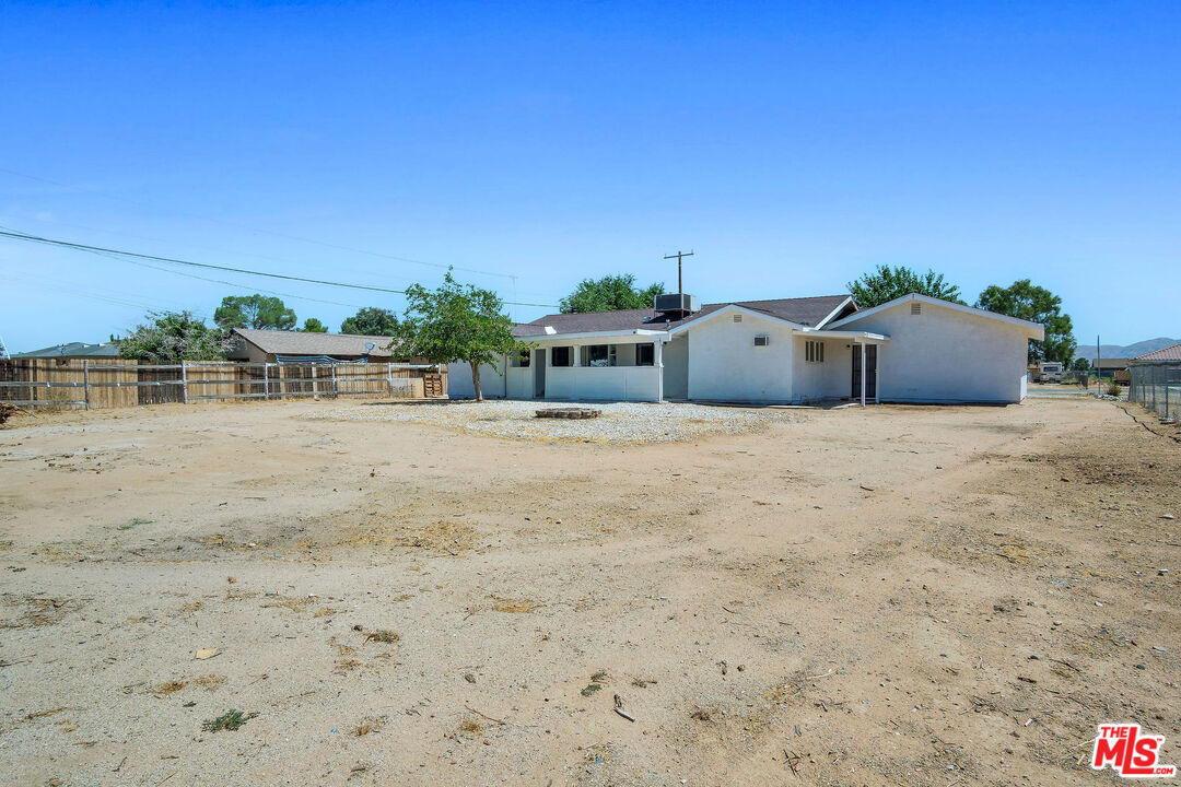15376 Washoan Road Apple Valley, CA 92307 - Photo 39 of 40 a view of a terrace with chairs