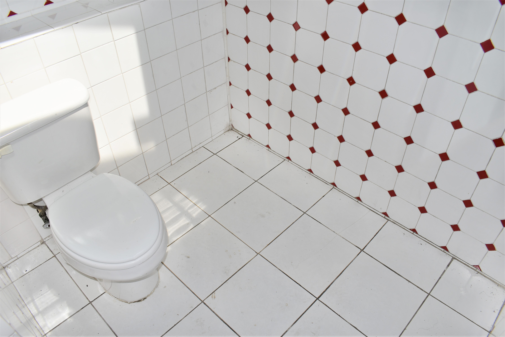 3824 Sunset Avenue Markham, IL 60428 - Photo 20 of 24 a white toilet sitting next to a white wall