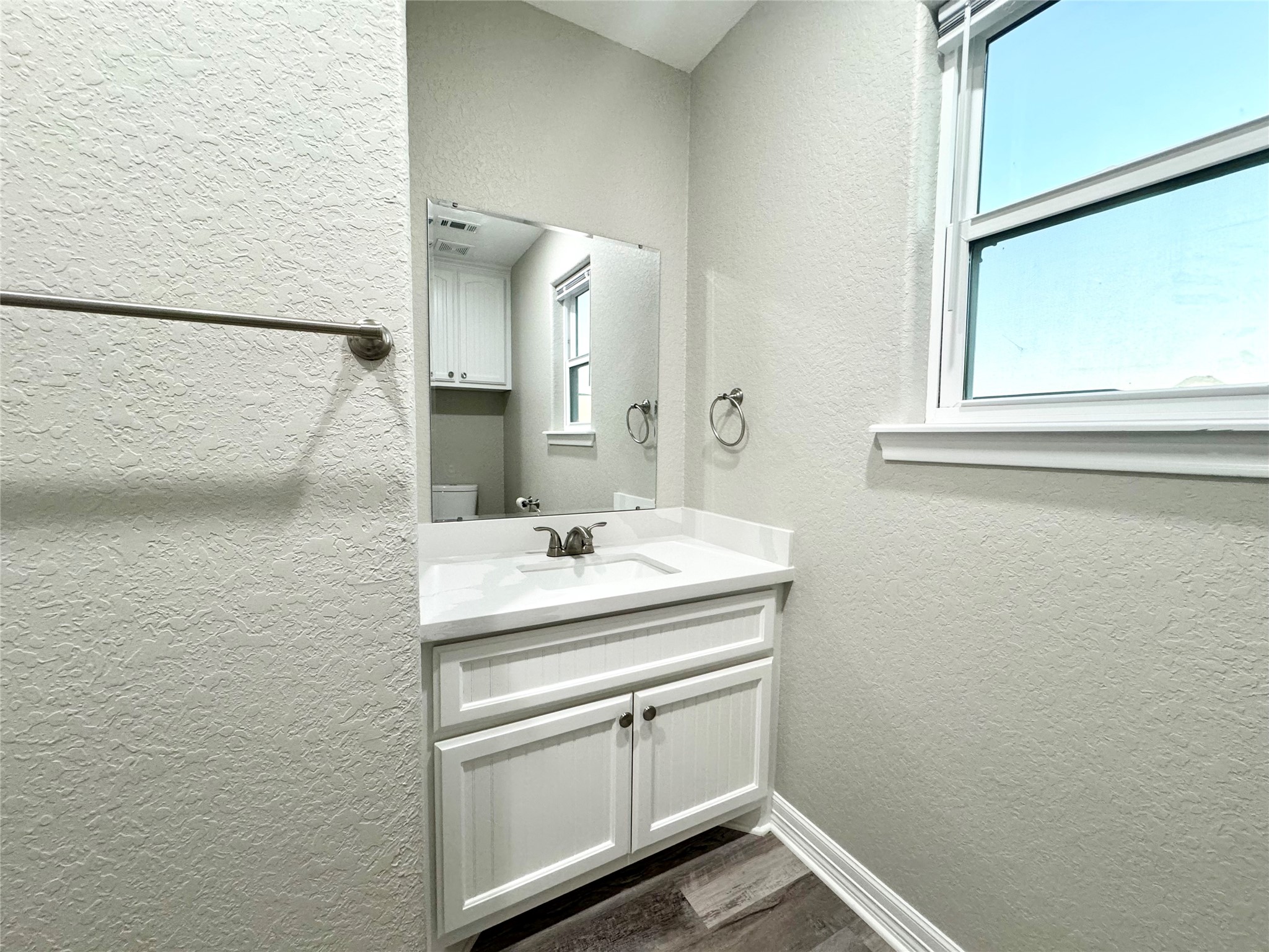 511 Caisson Street Surfside Beach, TX 77541 - Photo 15 of 33 a bathroom with a sink and a mirror