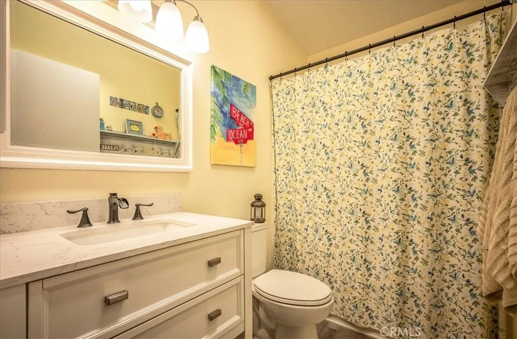 15181 Van Buren, Unit 178 Riverside, CA 92504 - Photo 21 of 52 a bathroom with a sink and a toilet