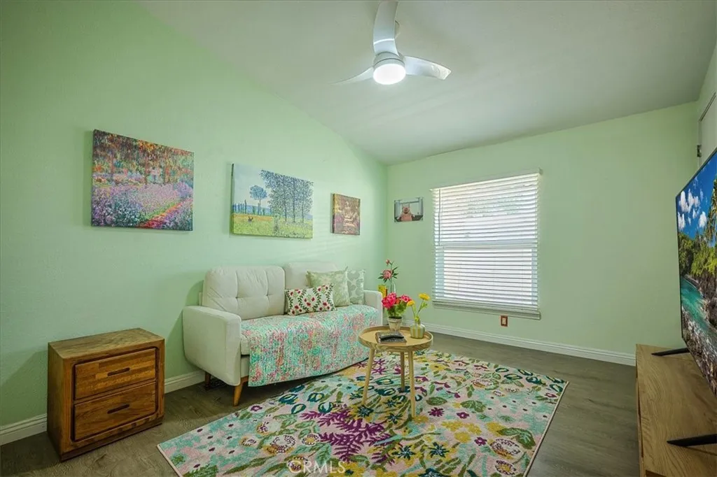 15181 Van Buren, Unit 178 Riverside, CA 92504 - Photo 22 of 52 a living room with furniture and a window