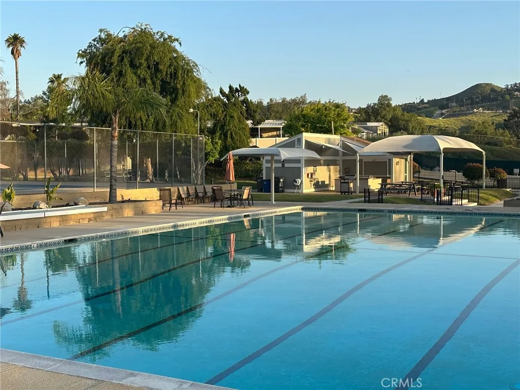 15181 Van Buren, Unit 178 Riverside, CA 92504 - Photo 42 of 52 a view of a lake with a house