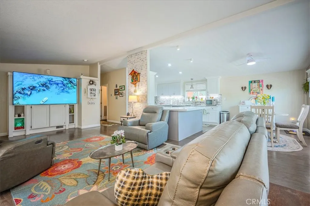 15181 Van Buren, Unit 178 Riverside, CA 92504 - Photo 8 of 52 a living room with furniture and a table