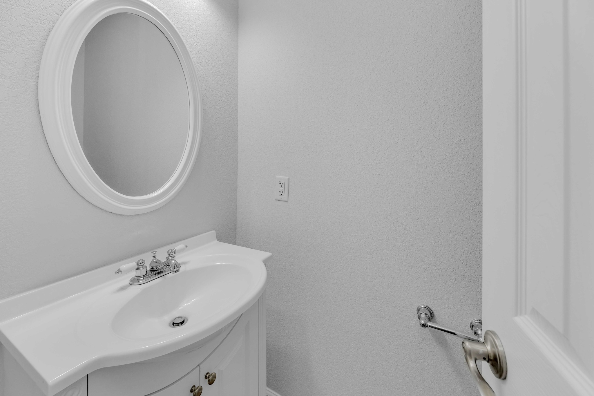 12528 Labrador Cove Austin, TX 78729 - Photo 30 of 40 Powder Bath: Conveniently located guest bath with a pedestal-style vanity, clean finishes, and a bright, neutral design ideal for everyday use and entertaining.