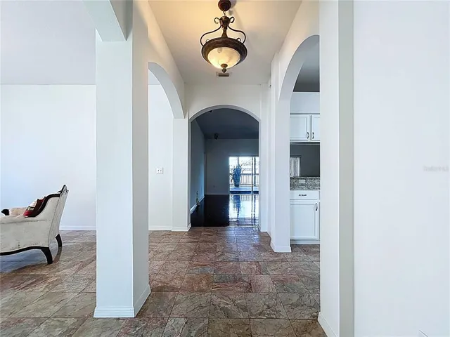 a large bathroom with a double vanity sink and a mirror