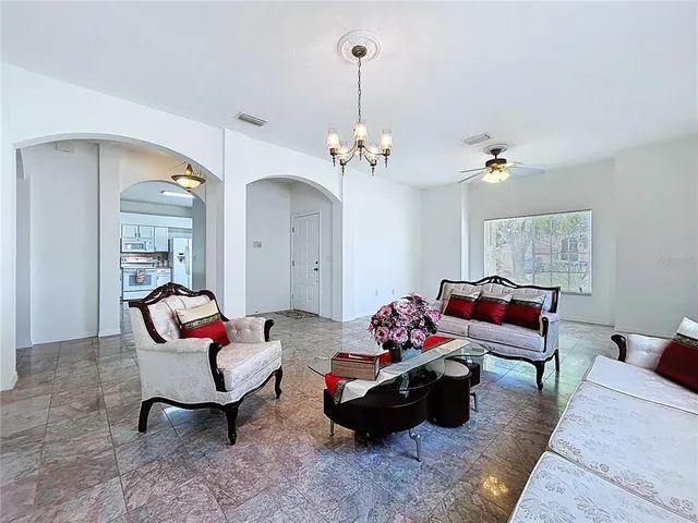 a view of a swimming pool with a yard