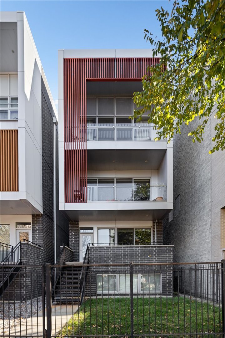 a front view of a house with balcony