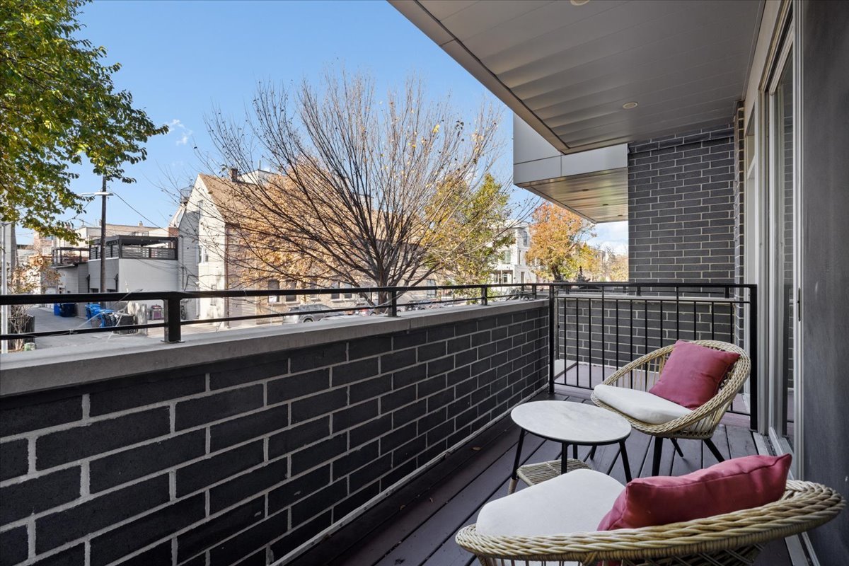 Undisclosed Address Chicago, IL 60622 - Photo 17 of 21 a view of a chairs and table in the balcony