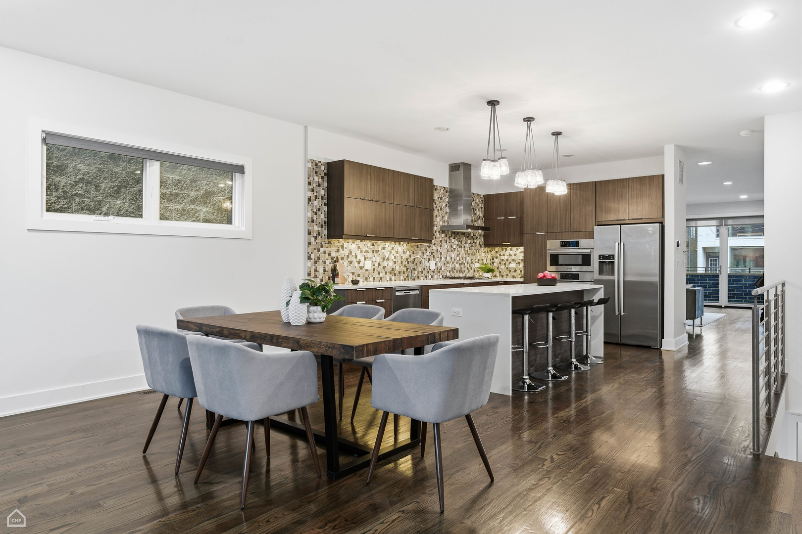 Undisclosed Address Chicago, IL 60622 - Photo 5 of 21 a dining room with furniture and wooden floor