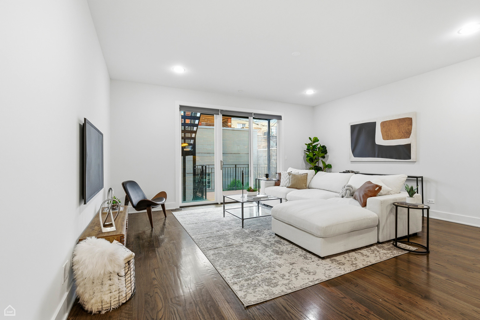 Undisclosed Address Chicago, IL 60622 - Photo 7 of 21 a living room with furniture and a large window