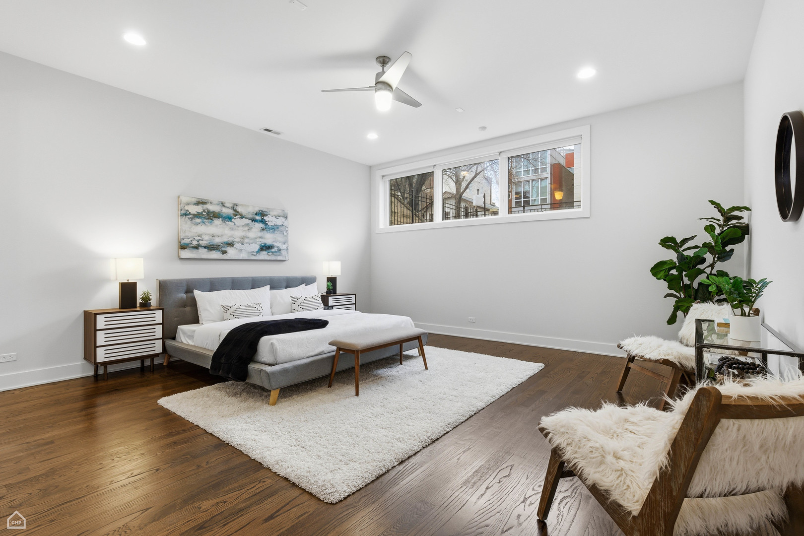 Undisclosed Address Chicago, IL 60622 - Photo 9 of 21 a living room with furniture and a potted plant