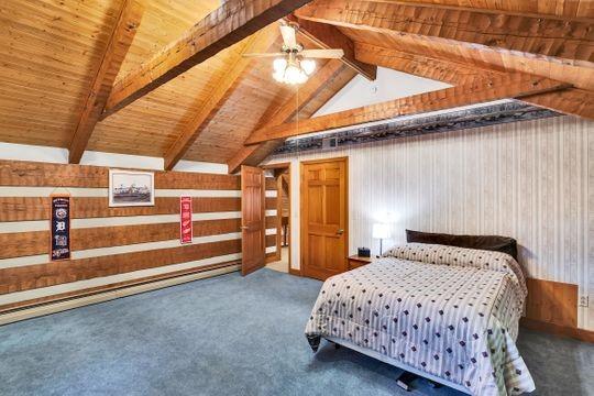 226 Ashbaugh Road Jeannette, PA 15644 - Photo 11 of 25 a bedroom with a bed and a walk in closet
