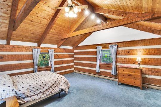 226 Ashbaugh Road Jeannette, PA 15644 - Photo 12 of 25 a bedroom with bed and a large window