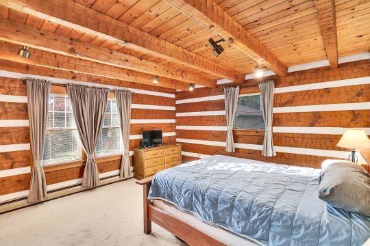 226 Ashbaugh Road Jeannette, PA 15644 - Photo 10 of 25 a bed sitting in a spacious bedroom next to a window