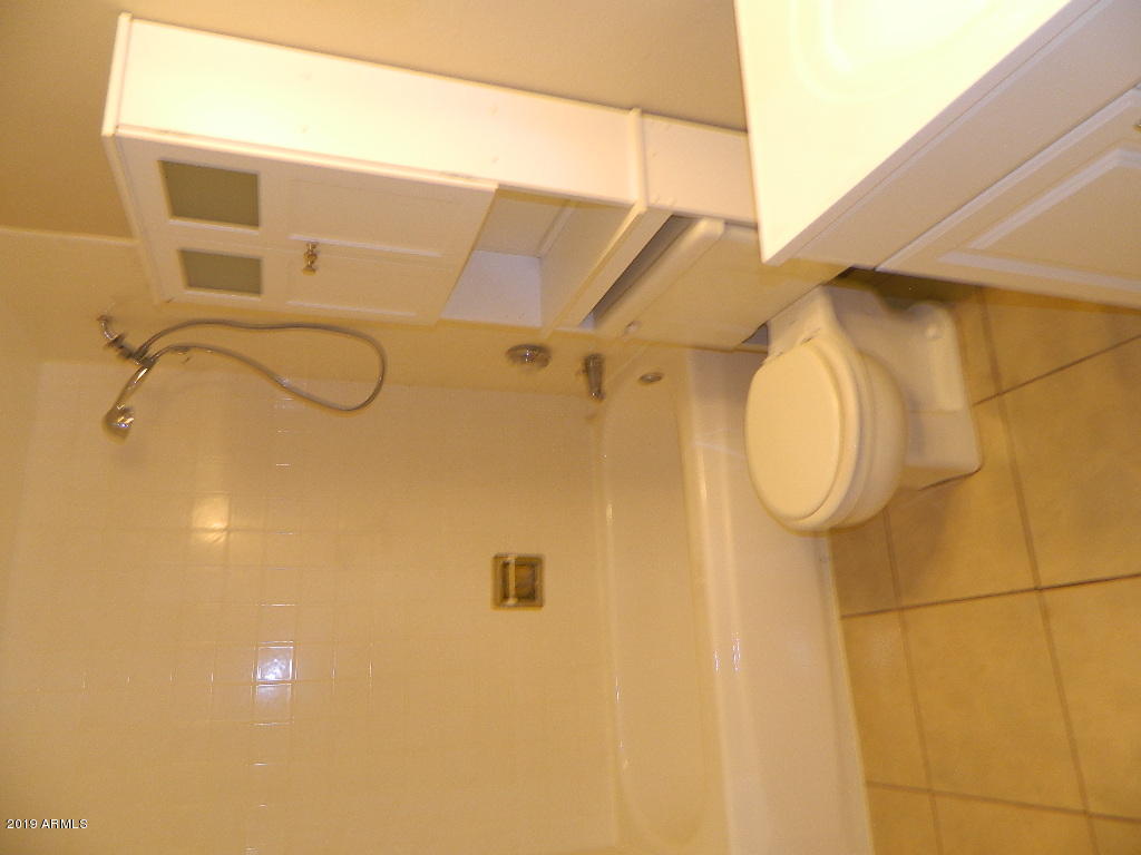 7830 East Camelback Road, Unit 212 Scottsdale, AZ 85251 - Photo 16 of 45 a bathroom with a shower