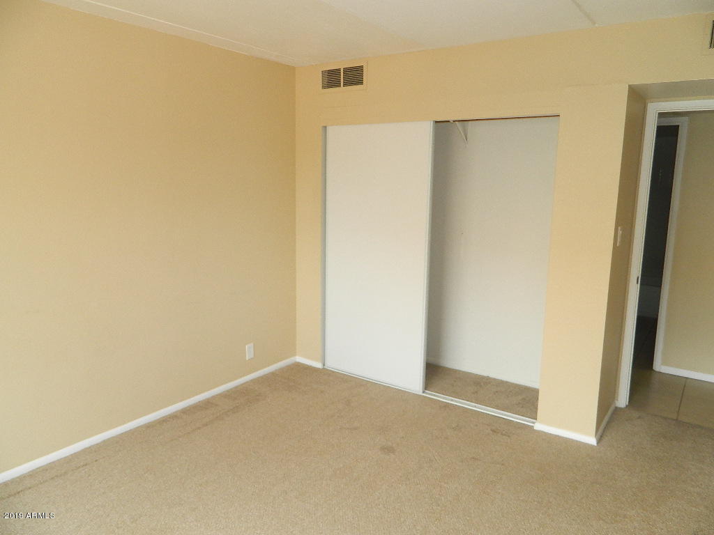 7830 East Camelback Road, Unit 212 Scottsdale, AZ 85251 - Photo 18 of 45 a view of small space with wooden floor