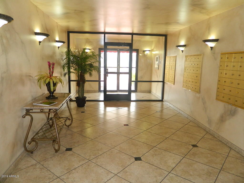 7830 East Camelback Road, Unit 212 Scottsdale, AZ 85251 - Photo 26 of 45 a bathroom with a shower