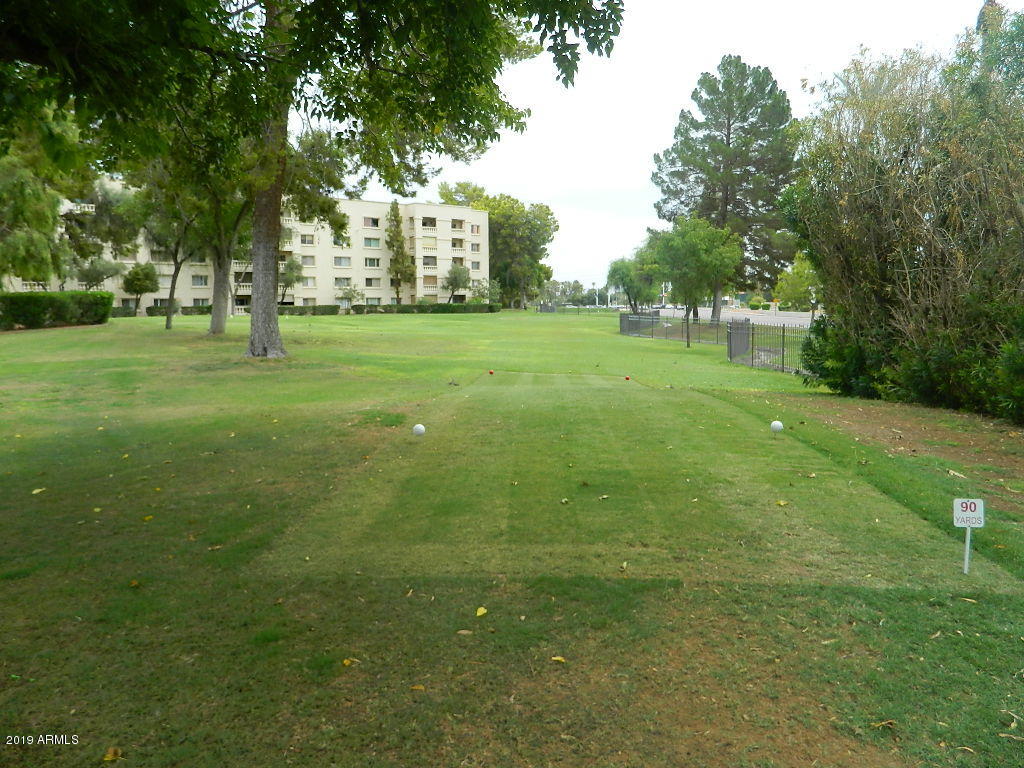 7830 East Camelback Road, Unit 212 Scottsdale, AZ 85251 - Photo 40 of 45 a view of building with trees