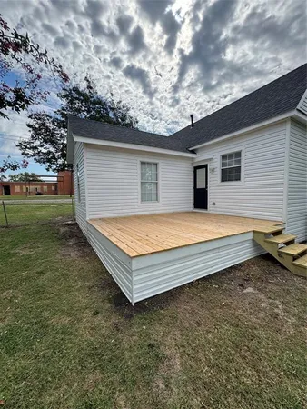 a view of a backyard with a garden