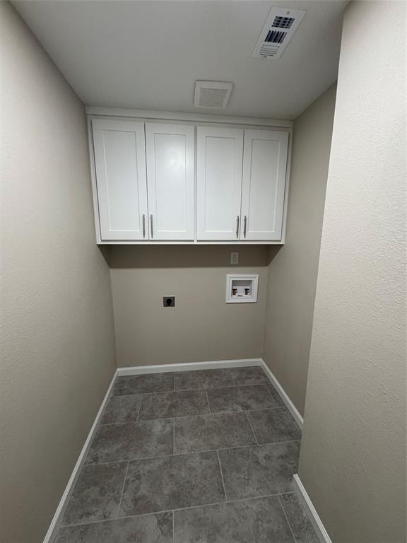 306 North College Street Howe, TX 75459 - Photo 7 of 15 a room with cabinets