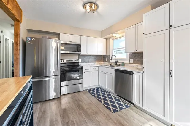 $250,000 | 217 North Maple Terrace, Wellsville, KS 66092