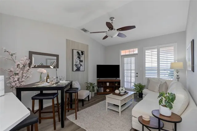 a view of a swimming pool with a lounge chairs