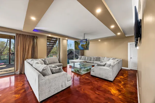 a dining room with furniture and a fireplace