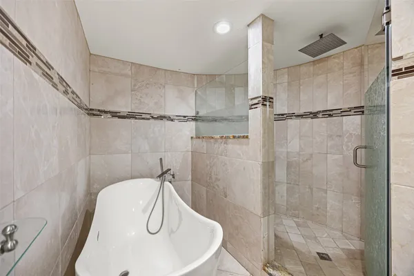 a bathroom with a sink mirror vanity and toilet