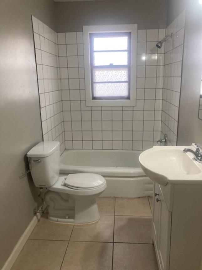 6729 Macon Road Memphis, TN 38134 - Photo 12 of 16 a bathroom with a sink a toilet and shower