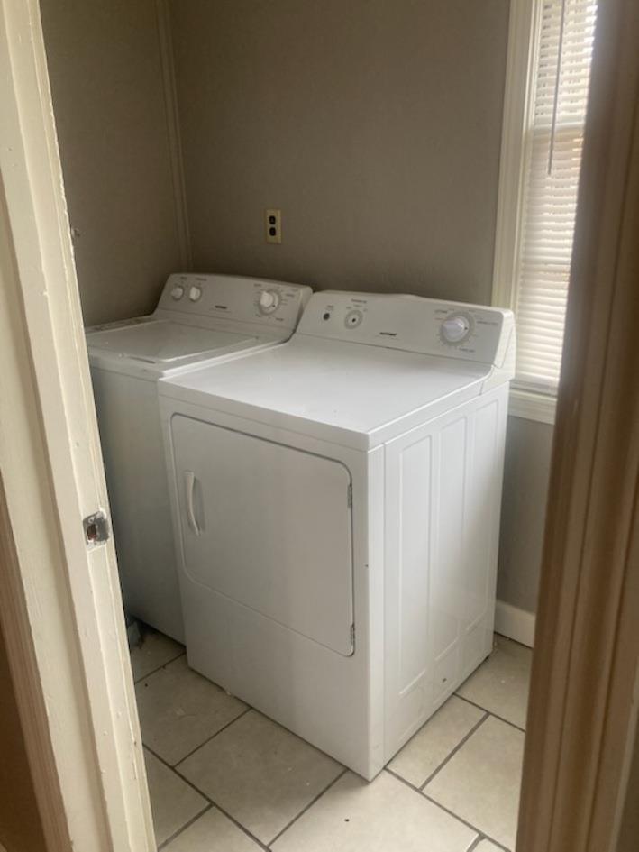 6729 Macon Road Memphis, TN 38134 - Photo 14 of 16 a utility room with dryer and washer