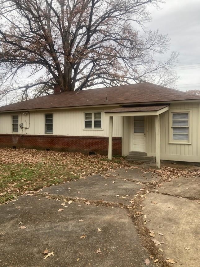 6729 Macon Road Memphis, TN 38134 - Photo 15 of 16 front view of house with a yard