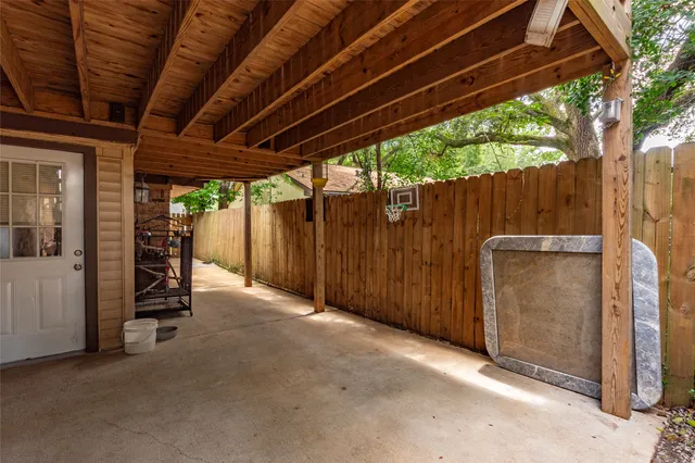 a view of a backyard of the house