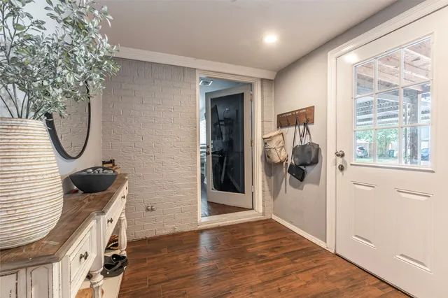 a view of a storage and utility room with a window
