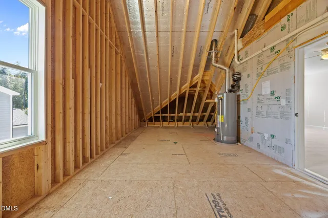 a front view of a residential houses with yard