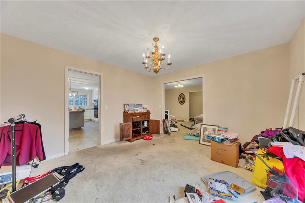 259 Holley Heights Jasper, GA 30143 - Photo 14 of 53 a bedroom with furniture and a flat screen tv