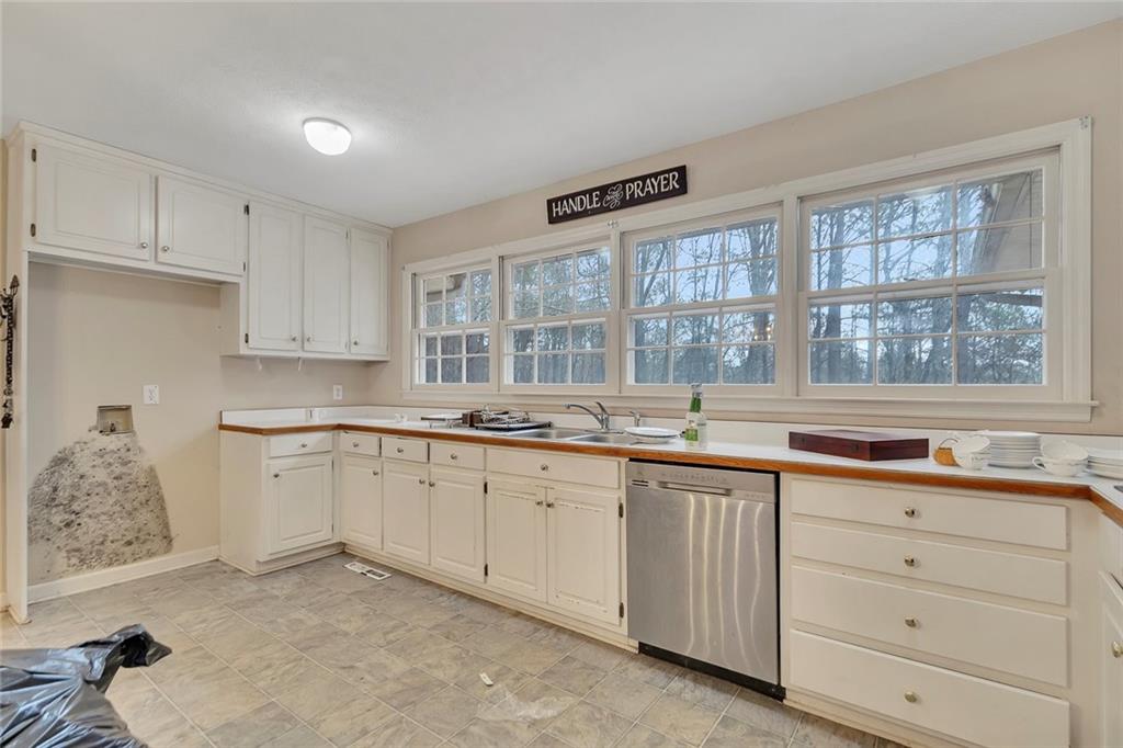 259 Holley Heights Jasper, GA 30143 - Photo 19 of 53 a kitchen with sink and window