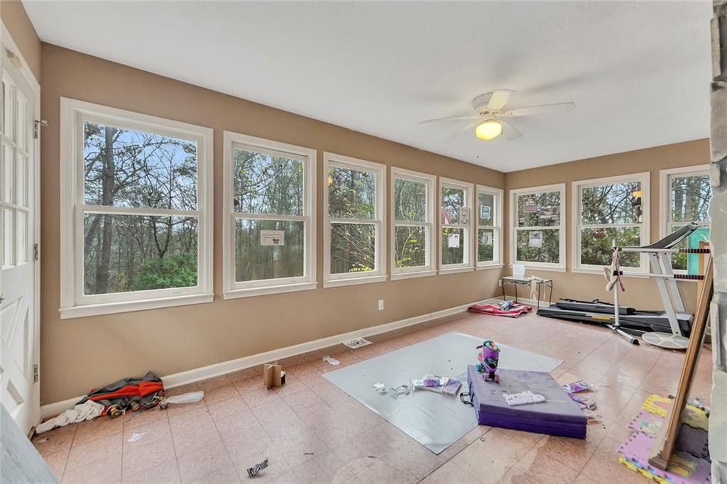 259 Holley Heights Jasper, GA 30143 - Photo 26 of 53 a bathroom with a tub a sink and a window