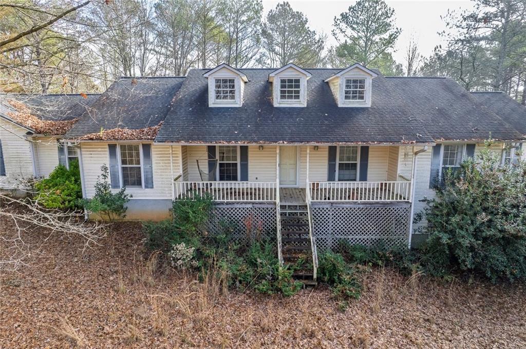 259 Holley Heights Jasper, GA 30143 - Photo 3 of 53 a front view of a house with garden