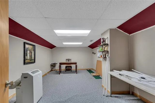 a room with furniture and a window